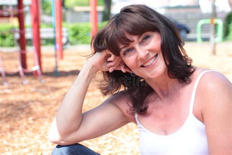 Beautiful Happy Mature Caucasian Woman Outside In The Park Stock Photo Image Of Girl Face