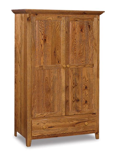 Angling tall pieces won't take up as much additional horizontal room and it will add interesting lines to your arrangement. Shaker Style Amish Armoire from DutchCrafters Amish Furniture
