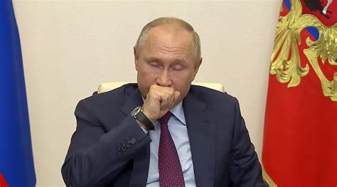 Putin breaks down in coughing fit during televised Covid conference as 