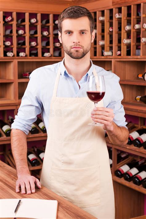 Do you hold wine glasses at the stem or bowl? Confident Winery Owner. Stock Photo - Image: 50263277