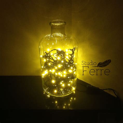 Pharmacy lights: This beautifull authentic pharmacy bottle is filled