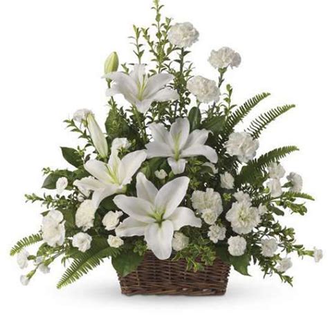 Eleganti e discreti non sono mai inappropriati. composizione in cesto fiori misti bianchi - Fiorista ...