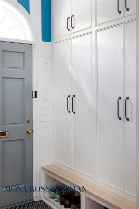 What are the benefits of having a mudroom? Floor to Ceiling Mudroom Cabinets with Shoe Shelves ...
