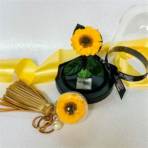 The best thing about this shop is that they offer gift sets so aside from the flowers you can also include other items. Preserved Sunflower Glass Dome
