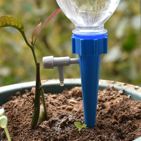 The rate of water flow. Drip irrigation system Plant Waterers DIY Automatic drip ...