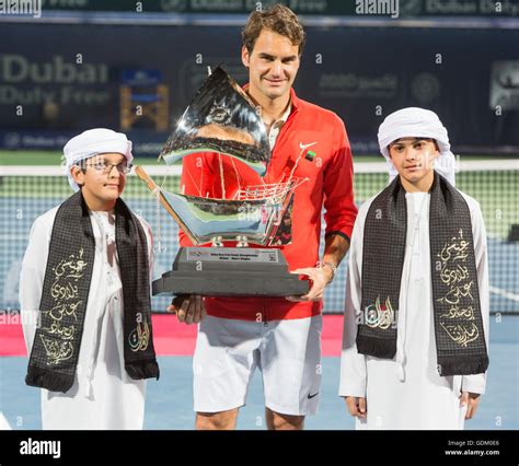 Roger Federer Poses With His Winners Trophy Dubai Tennis Stadium