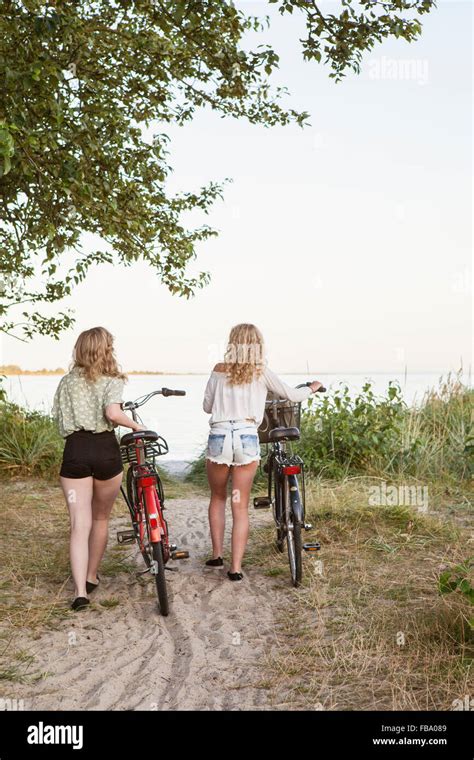 Sweden Blekinge Hallevik Rear View Of Two Teenage Girls14 15 16 17