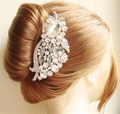 Have your stylist twist your long tresses (or extensions) and then gently pull on the edges to create a perfectly messy updo. Top Wedding Hairstyle Trends for 2013 | WeddingElation