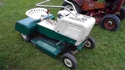Some Lawn Mowers And A Jeep At The Tractor Show Youtube