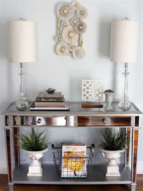 The most common foyer table decor material is metal. Foyer Console Ideas, Pictures, Remodel and Decor