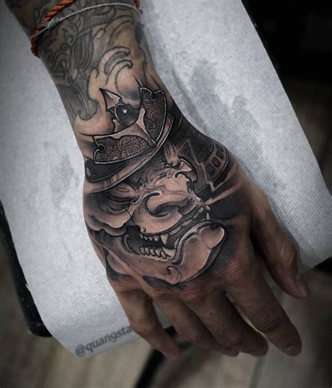 Traditional japanese tattoos that are done by hand are referred to as tebori, however tattoo technology has caught up and most designs are now done by artist's using a machine. Samurai hand jam #samurai #kabuto #blackandgrey # ...