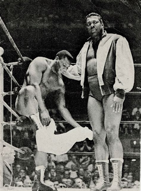 Bobo brazil uses hie head in this matchup agains. "Calypso Kid" Dory Dixon, on left, and Bobo Brazil were ...