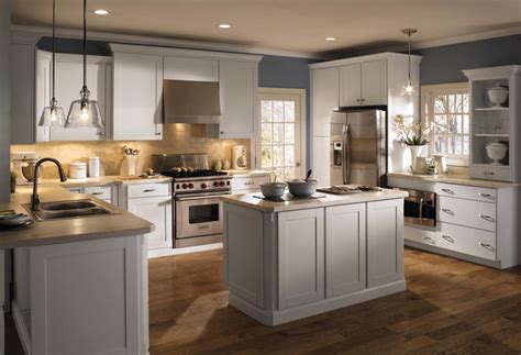 This shade works best with grey and white accents to give your entire kitchen a soft, inviting vibe. White Laminate Kitchen Cabinets | NeilTortorella.com