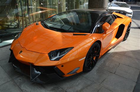 Jay leno reviews the lamborghini aventador. DMC Shows Tuned Lamborghini Aventador LP700-4 Roadster SV