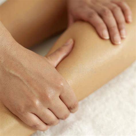Massage Therapist Massaging Womanand X27s Palm Conceptual Image Shot