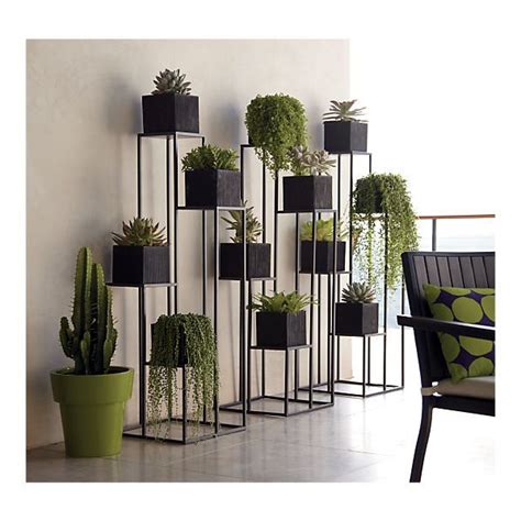 Tripods aren't just for cameras. Quadrant Plant Stand with Four Planters (C)... sadly to ...