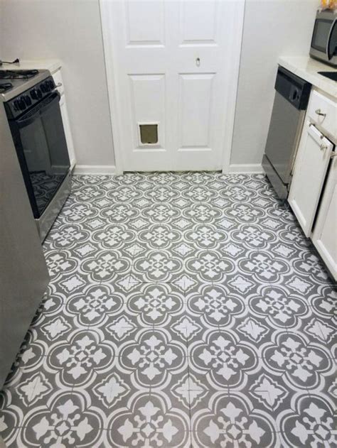 Budget home diy makeover to update a bathroom. 25 Stenciled and Painted Floor Tiles
