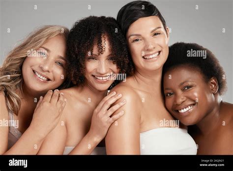 You Grow Where You Feel Accepted Shot Of A Diverse Group Of Women Standing And Hugging Each