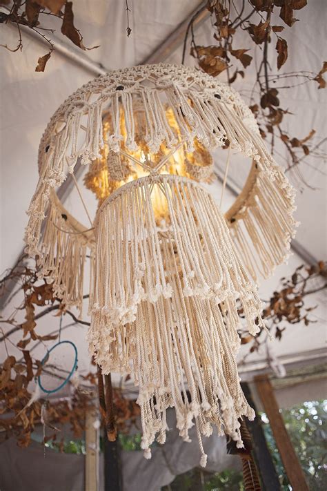 Maybe you would like to learn more about one of these? Macrame hanging table TURNED into a chandelier using a ...