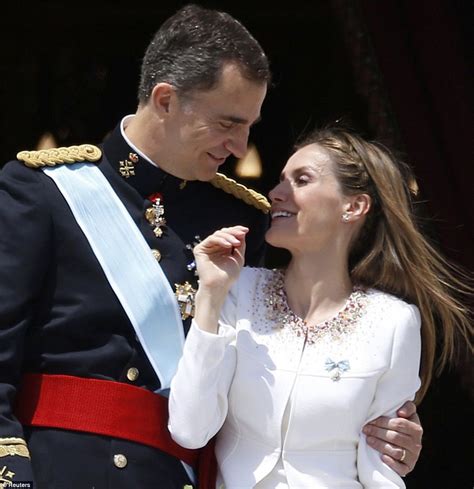 King Felipe Of Spain Kisses New Queen Letizia As He Takes Crown From