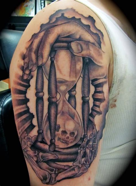 If you are also an admirer of the monochromatic and graceful shade scheme, then do take a look at the. Black And Grey Skull In Hourglass Tattoo On Half Sleeve ...
