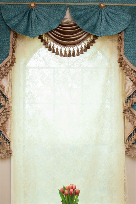 One swag (pair) + two valances in between over two tier (pairs). Blue Salon swag valances curtain drapes 50''