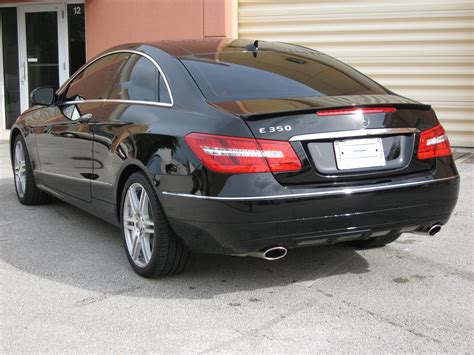 The r350 with a traditional. 2010+ Mercedes E-Class Coupe Euro Style Rear Lip Spoiler
