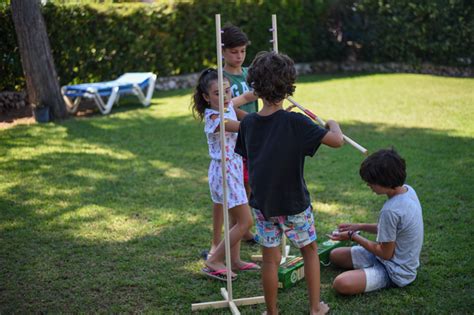 Lioobo juego de juego limbo juego de paletas de playa equipo para acampar con una raqueta de madera raqueta de bádminton bola de críquet juego de volante entrenamiento familiar. Limbo de Cayro, un juego para bailar y jugar con los amigos