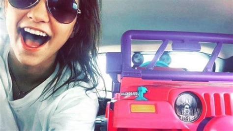 College Girl Rides A Pink Barbie Jeep Around Campus