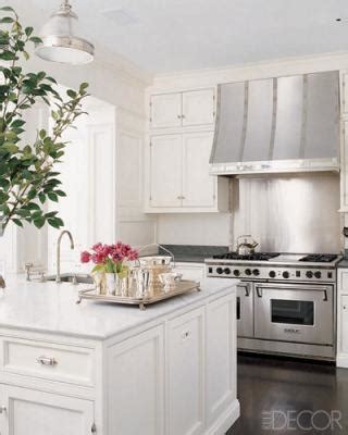 Wall mount range hood has a distinctive design from the thin profile chimney to the sleek modern style that captures ones attention. French Range Hood - Transitional - kitchen - Elle Decor