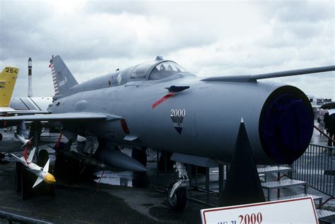 The dash helmet allows the pilot to fly. MiG-21 2000 Romanian Air Force 5902 Paris Air Show 1993 ...