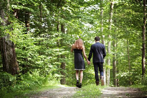 Elegant Couple Walking Through Forest Stock Photo Dissolve