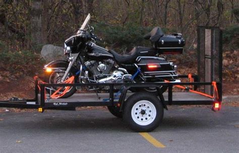 I would also use the swing arm and the top of the fork tree as my other two anchor points for straps. Trailering, How do you tie down your bagger? - Page 2 ...