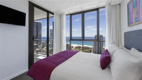 Located at the back of the building with great hinterland views features include: The Beach Level 19 Ocean Views - Holiday Holiday