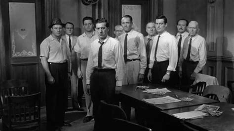 During the trial of a man accused of his father's murder, a lone juror takes a stand against the guilty verdict handed down by the others as a result of their preconceptions and prejudices. 12 Angry Men (1957) : CineShots