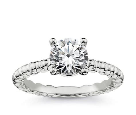 When you begin the process of buying an engagement ring however, you learn that it's anything but simple! Jennifer Love Hewitt's Engagement Ring From Brian Hallisay ...