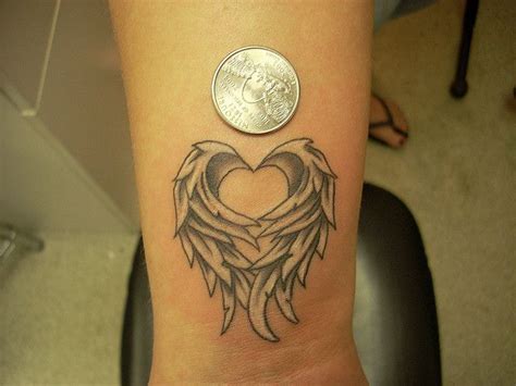 Heartwings Tattoomaybe Something Like This In Between My