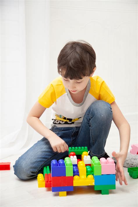 Boy Playing With Building Blocks · Free Stock Photo