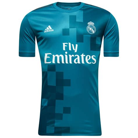 Das real madrid trikot der letzten saison weist orange applikationen und details auf, wodurch es mit den traditionen des spanischen klubs bricht. Real Madrid 3. Trikot 2017/18 Authentic | www.unisportstore.de