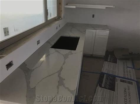 They are where meals are cooked, families eat, and friends socialise. Biaco Calacatta White Quartz Grey Kitchen Countertops ...