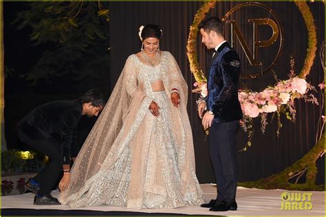 While her groom, jonas wore a navy tux. Nick Jonas & Priyanka Chopra Celebrate at Wedding ...