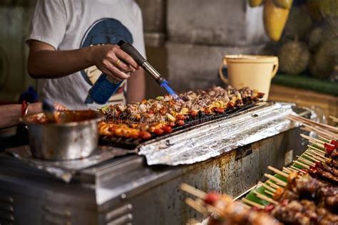 Chef Is Heating Meat At A Street Food Stand In Bangkok Thailand Stock