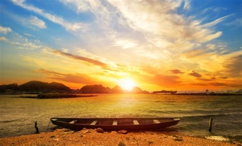 Beautiful Sunset Beach Landscape With A Boat Photo Free