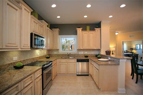 Beige granite countertops with white cabinets and subway tile. 101 Beige Kitchen Ideas (Photos) - Home Stratosphere