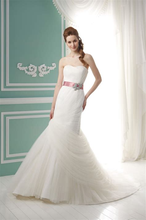 Here we see her wearing her wedding dress from disneys 'aladdin & the king of theives'. Jasmine Bridal Collection Fall 2012 - Belle The Magazine