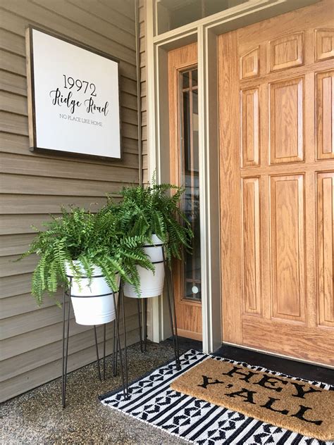 Front Door Decor With Enamel Plant Stands And Custom Address Sign