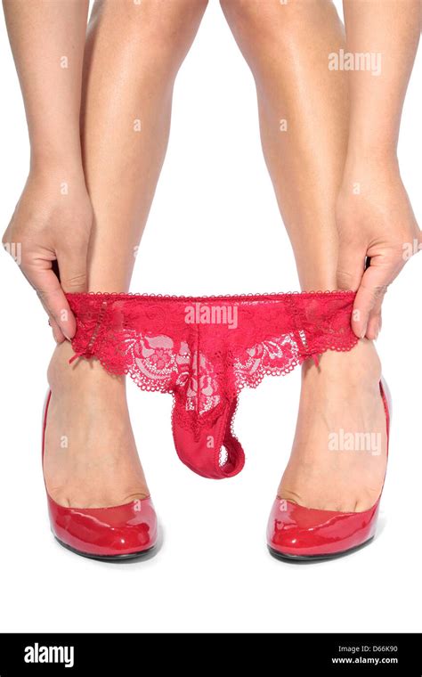 Woman Legs Taking Off Red Underwear Stock Photo Alamy