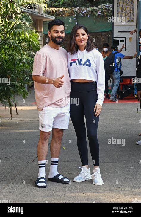 Indian Cricketer Virat Kohli Along With His Actress Wife Anushka Sharma Pose For A Photo At A