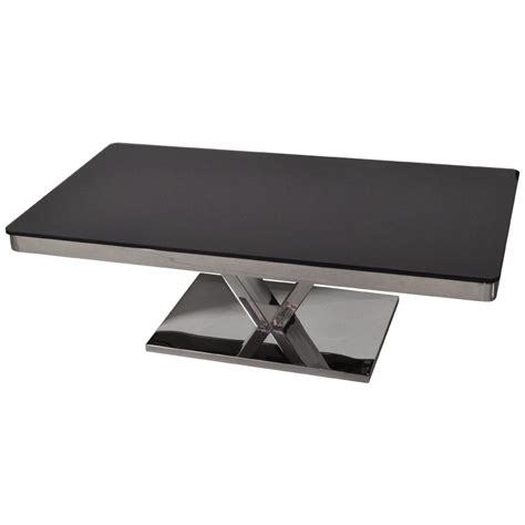 Table basse blanc laqué, noir laqué, table basse design, contemporaine, avec rangement… tout pour une déco de salon design. Table basse design plateau rectangulaire en verre noir et ...