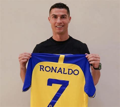 Cristiano Ronaldo Holds Al Nassr No7 Jersey After Contract Signed